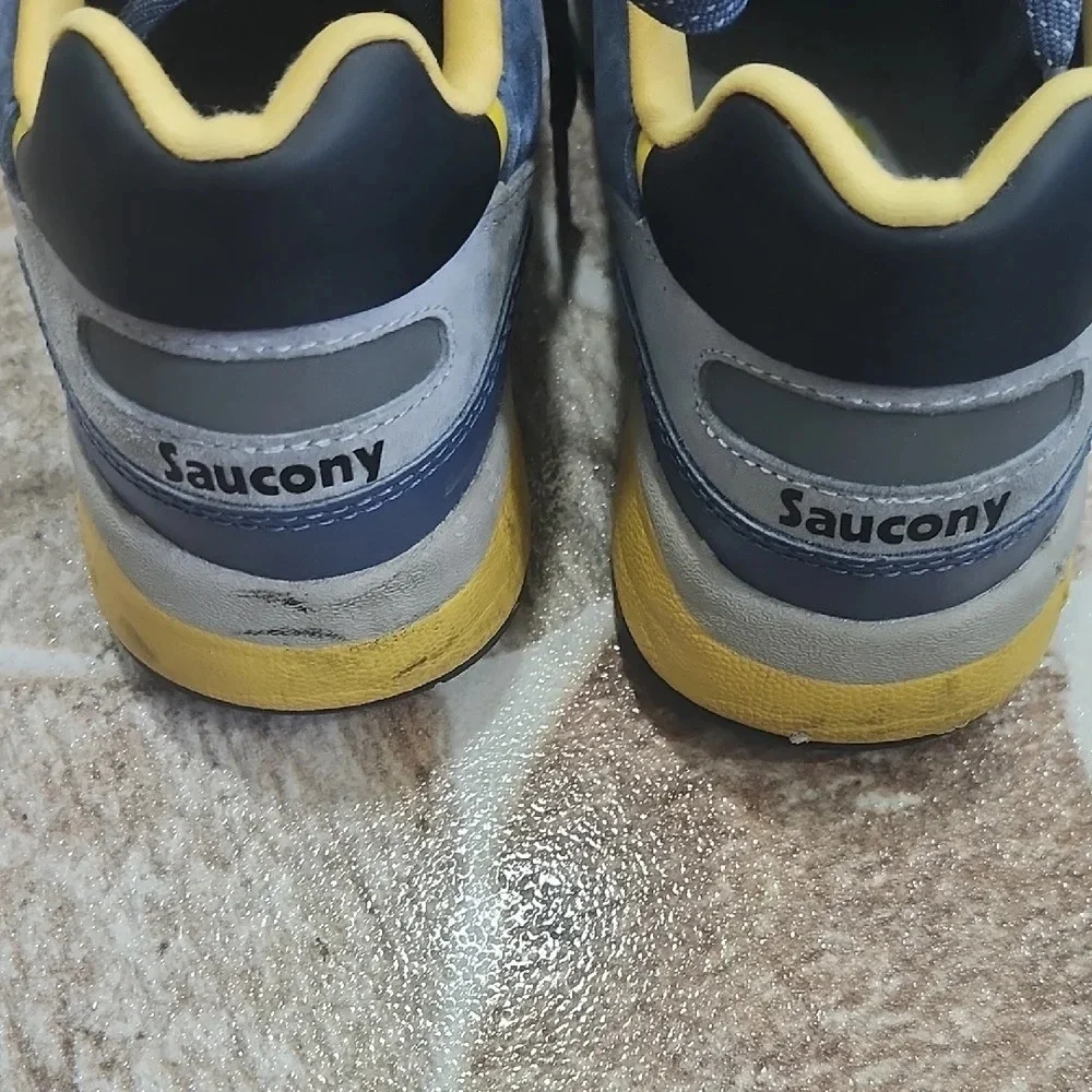 Saucony Blue and Yellow Sneakers Small stains of ink on both tennis in front